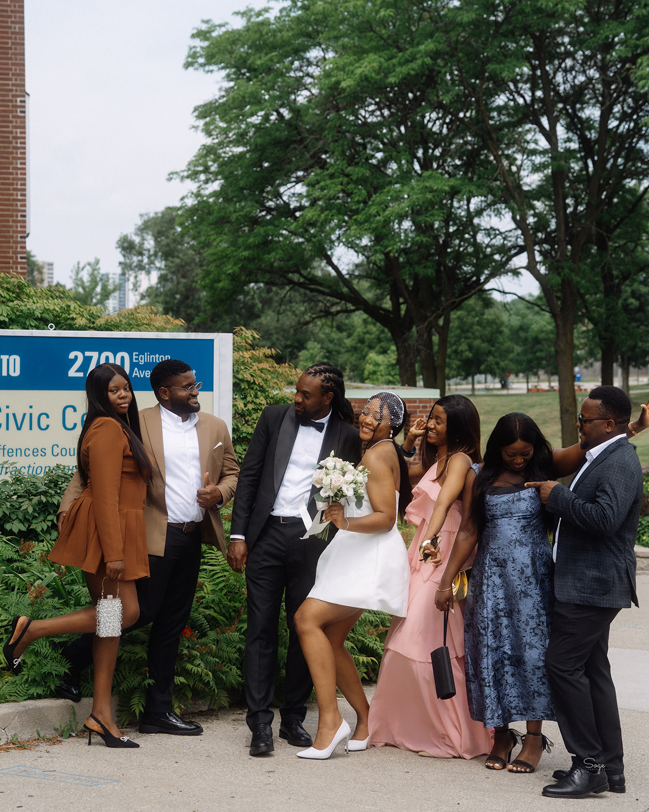 Modern minimalist wedding photography of families at Toronto civic centre